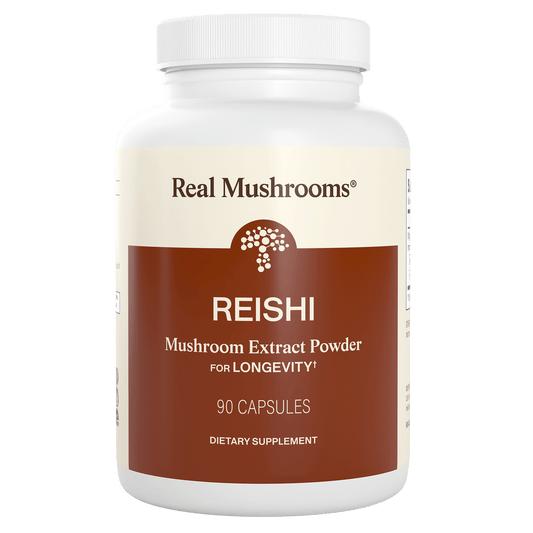 A white bottle labeled “Real Mushrooms Organic Reishi Mushroom Capsules—dietary supplement, 90 capsules.”.